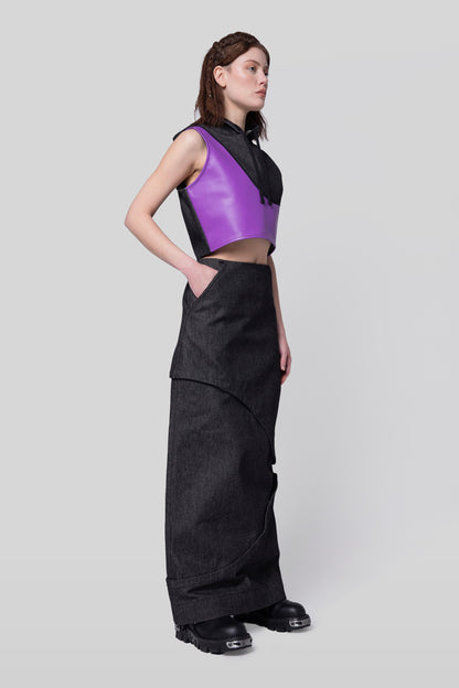 Angled view of 2nd Skin skirt with modular layers in carbon raw denim