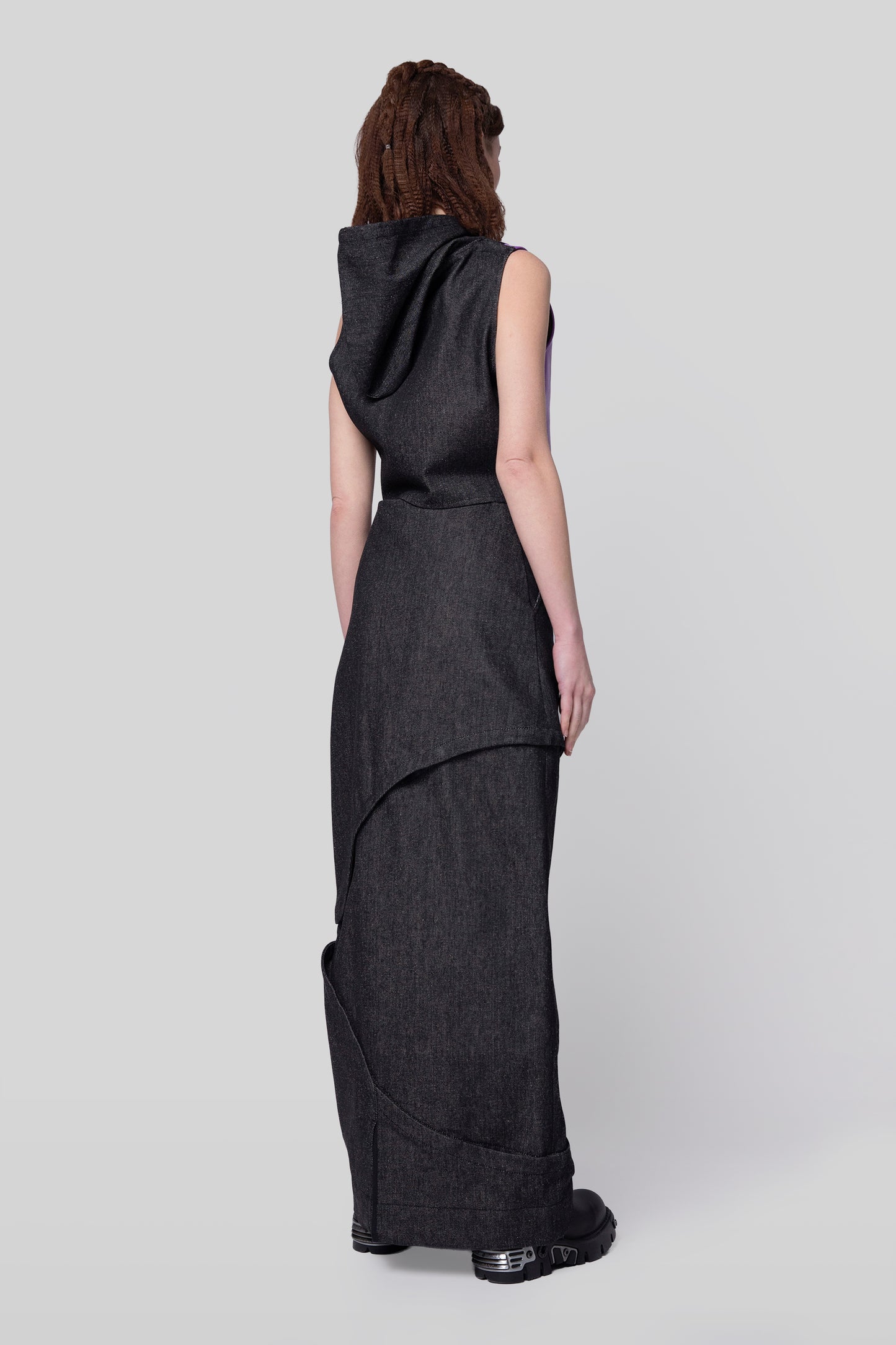 Back angled view of 2nd Skin skirt in carbon raw denim, full layered configuration