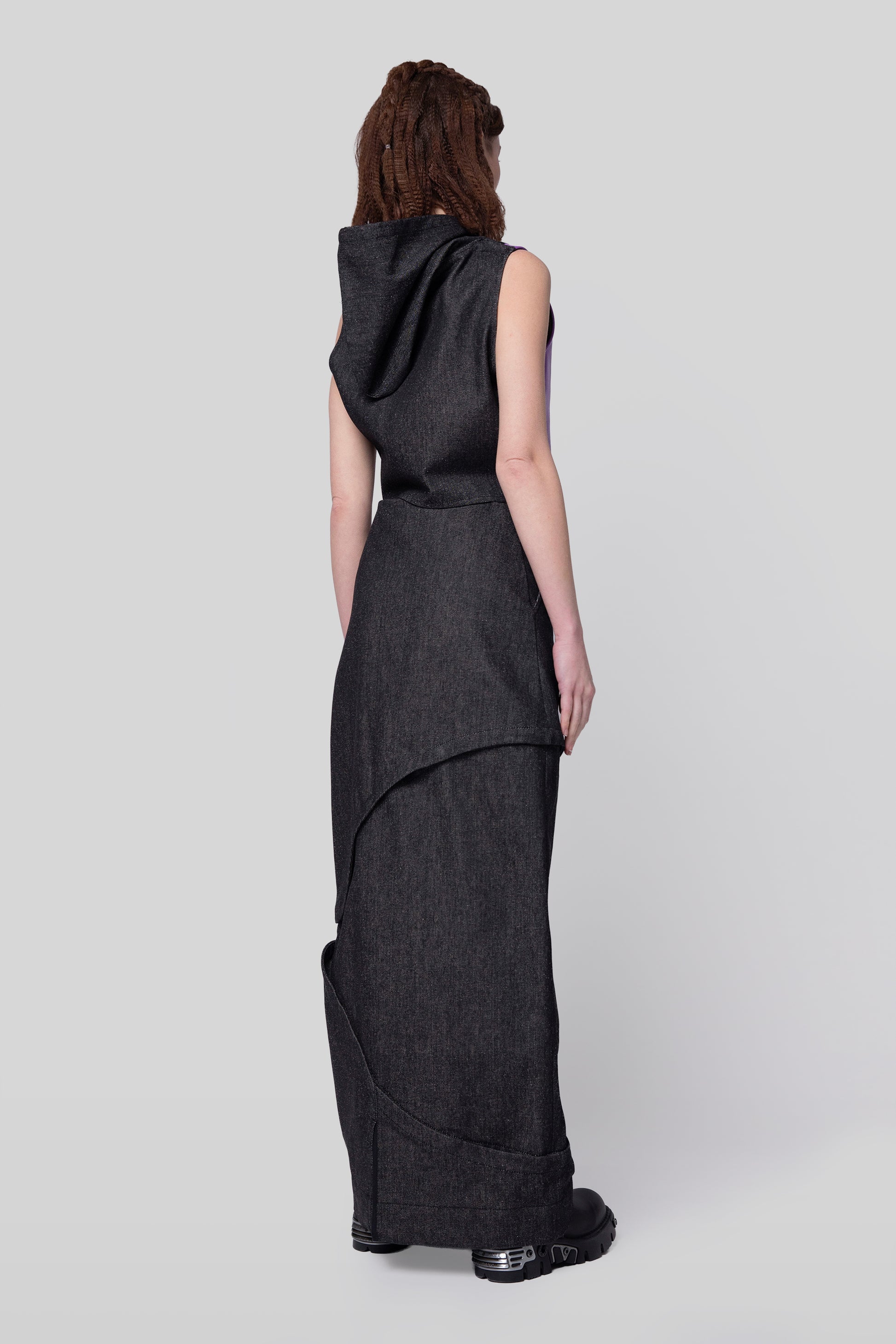 Back angled view of 2nd Skin skirt in carbon raw denim, full layered configuration