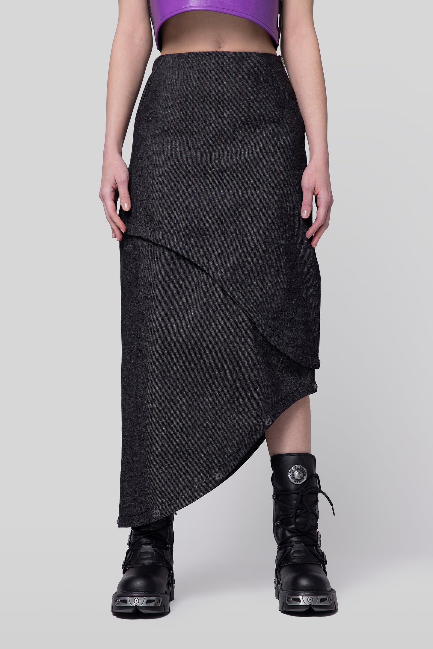 Lower view of 2nd Skin skirt showing layered panels in carbon raw denim