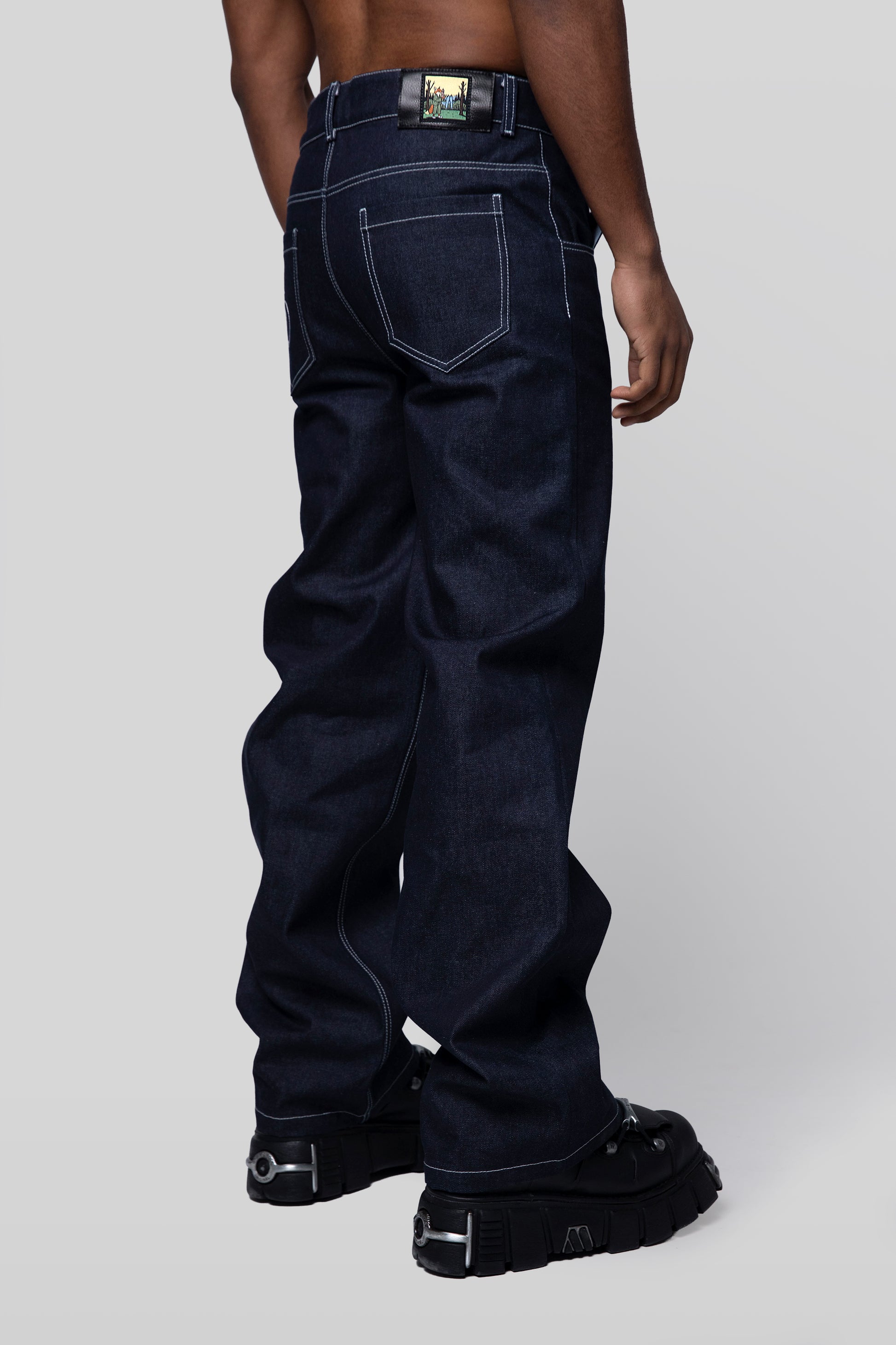 Alternate back view of indigo 4Front jeans, relaxed fit