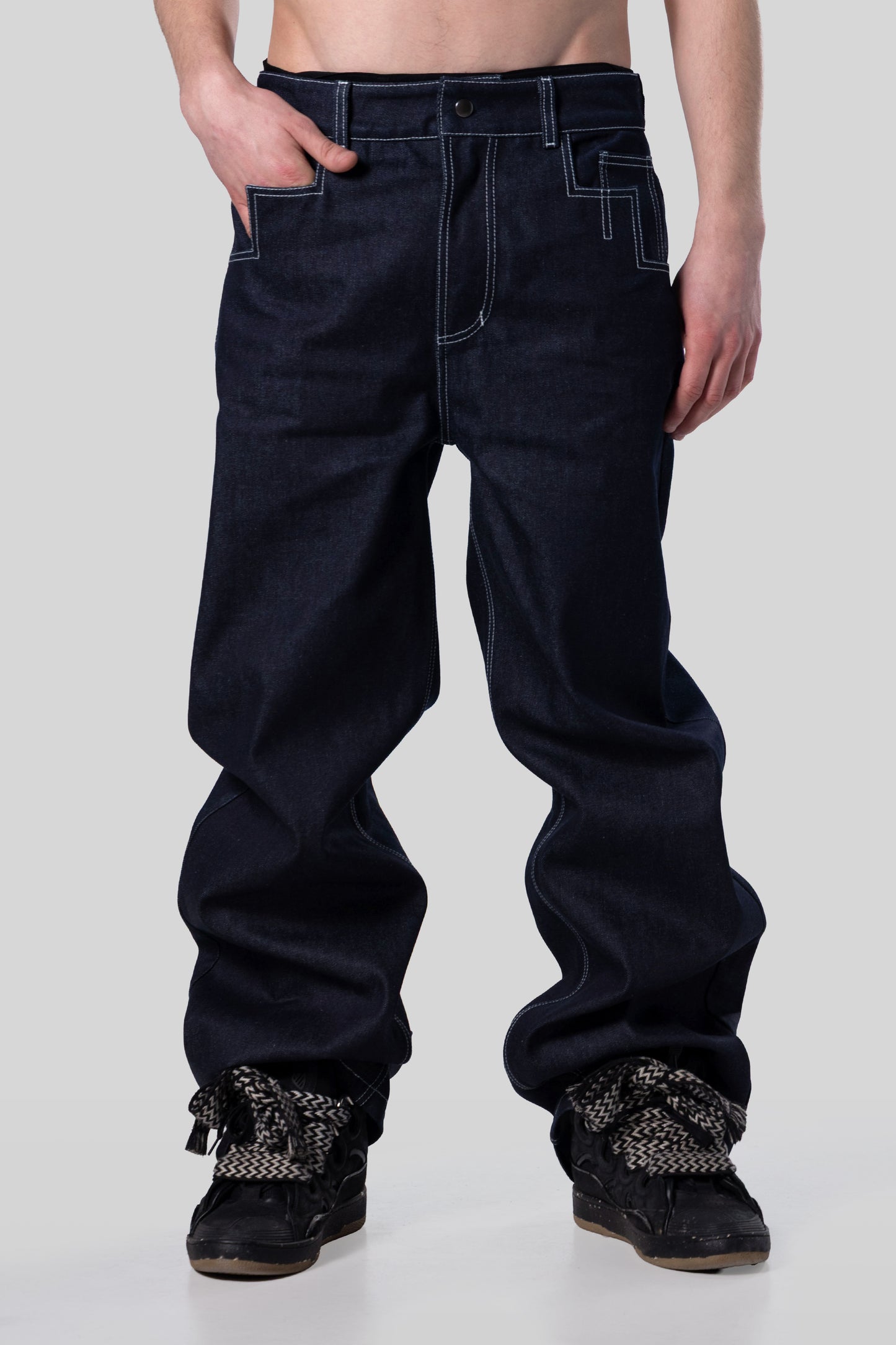 [card:men-secondary][card:all-secondary] Front view of indigo 4Front jeans showing wide leg and raw denim texture