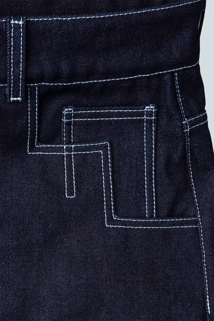 Close-up of stitching detail on indigo Candiani raw denim 4Front jeans