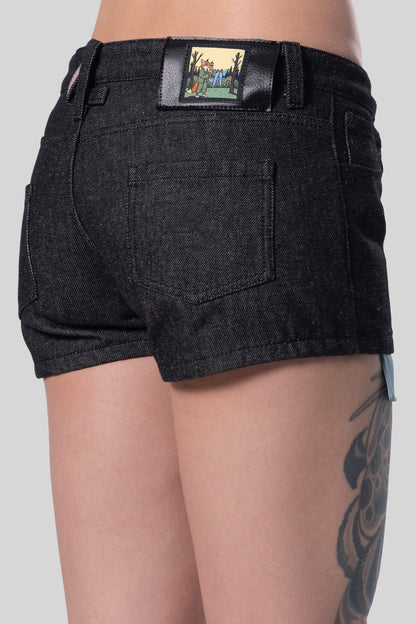 Close-up of back angled view of 4Sight shorts with fox illustration patch detail