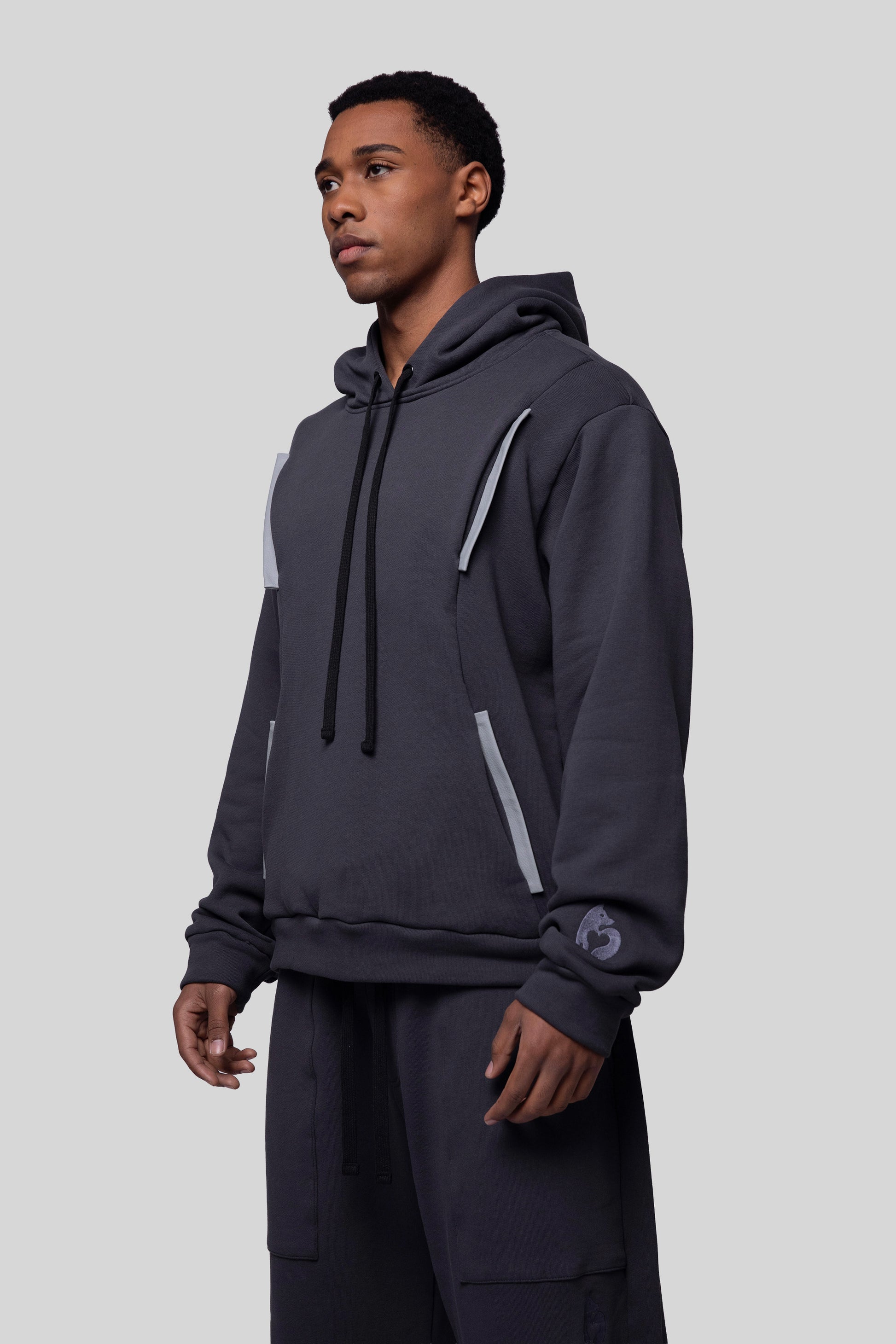 Angled view of Anchor hoodie showing pocket placement