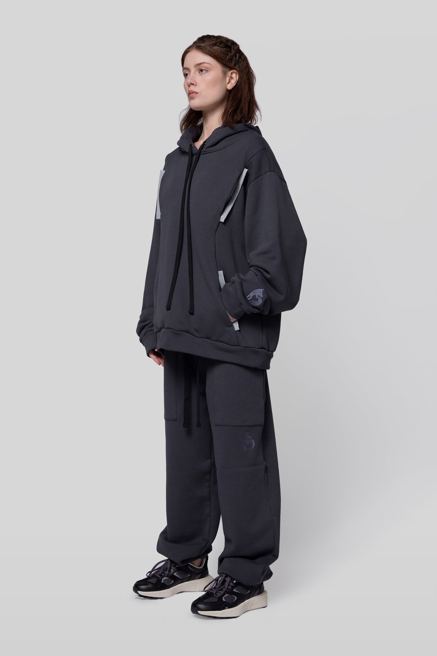 Angled view of Anchor hoodie with relaxed drape