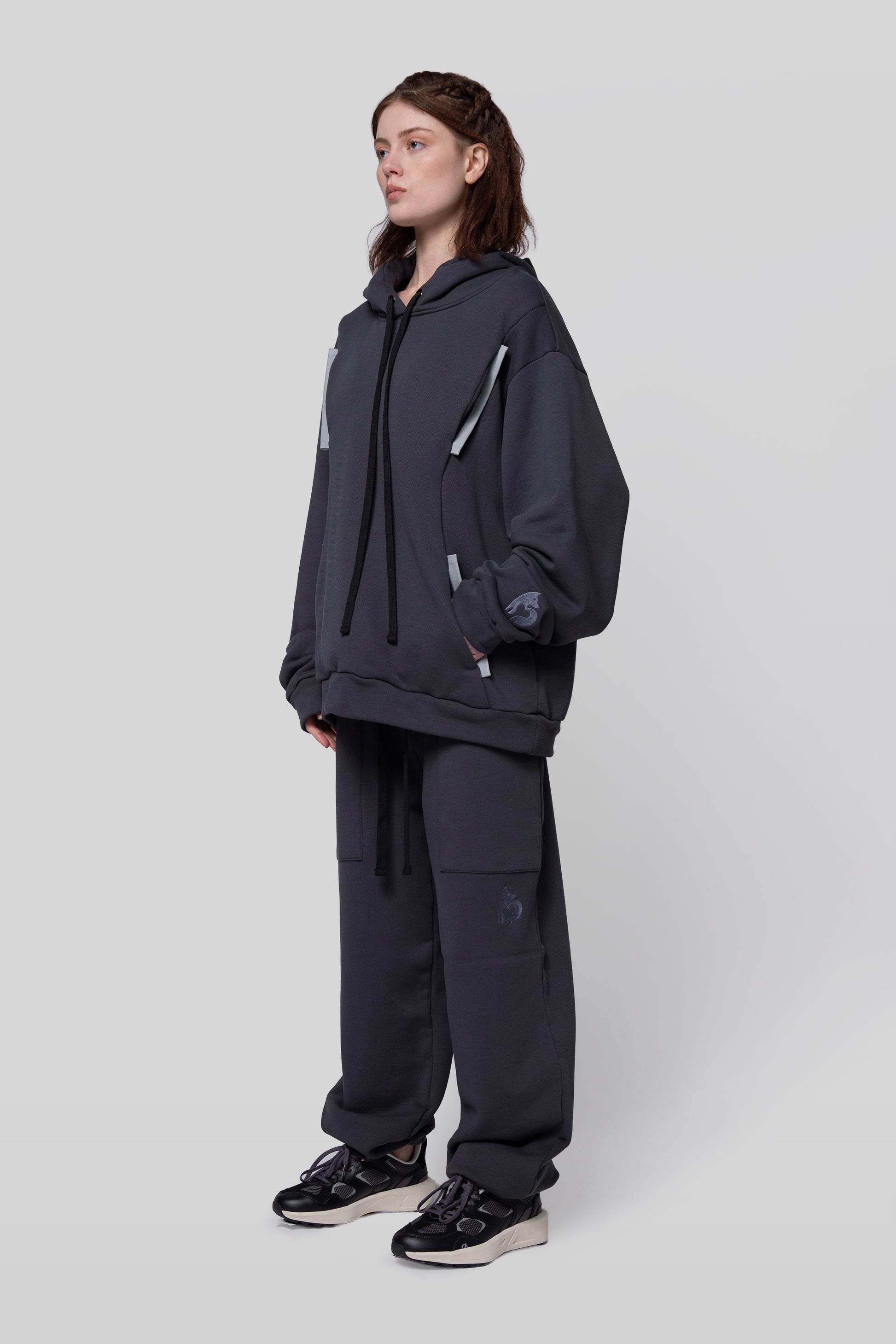 Angled view of Anchor hoodie with relaxed drape