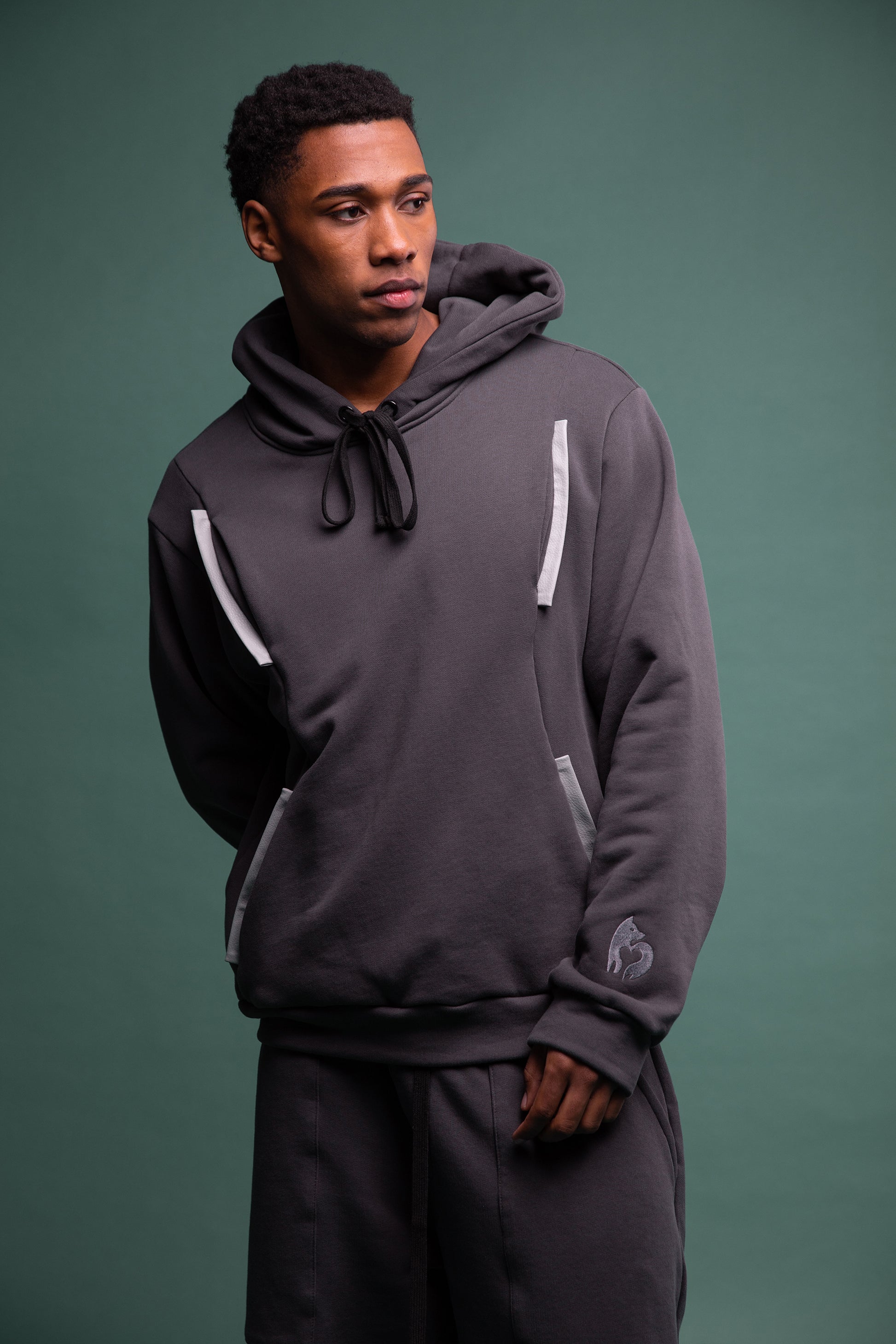 Angled view of Anchor hoodie in deep grey