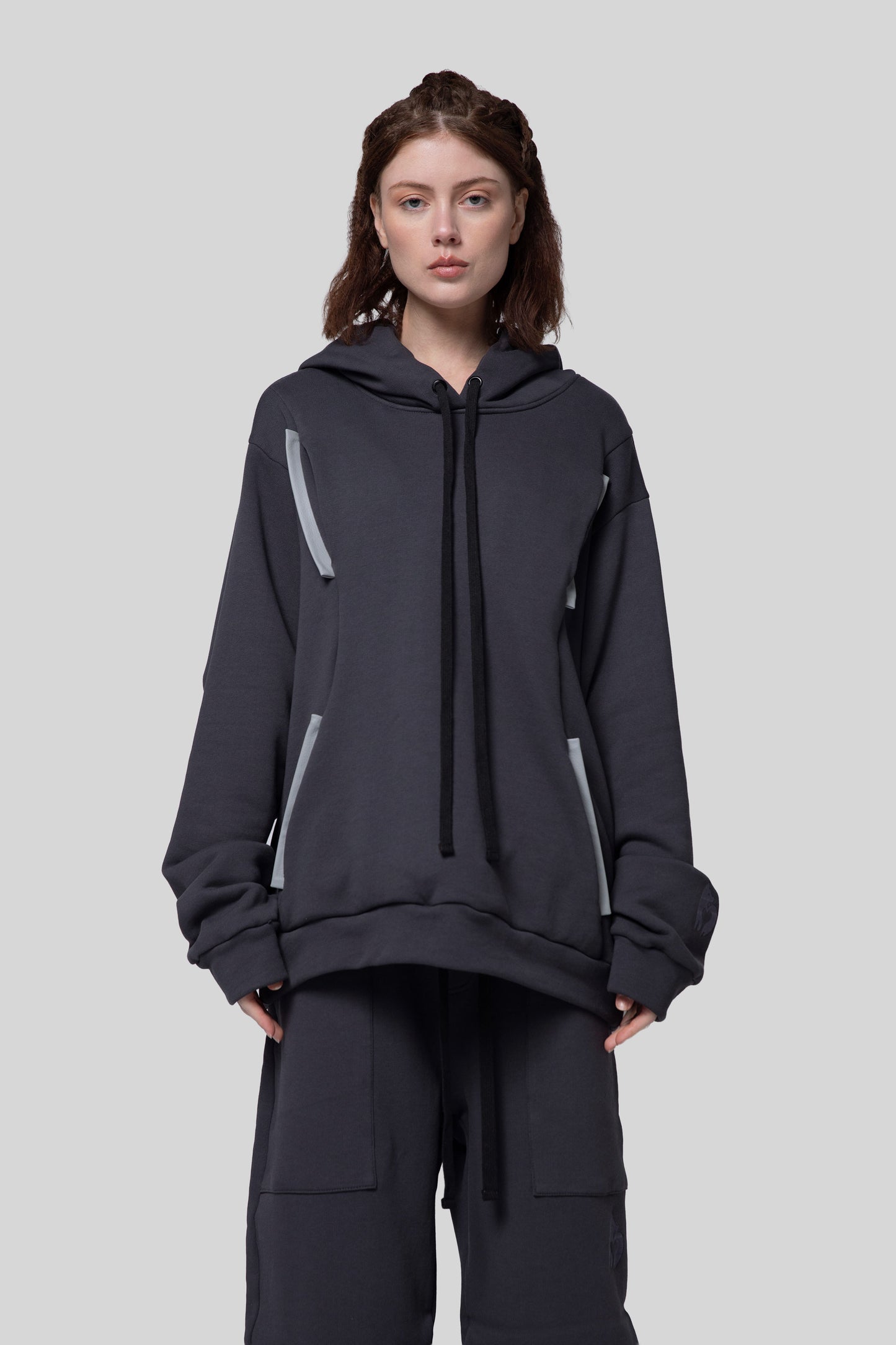 Front portrait of Anchor hoodie showing hood and chest pockets