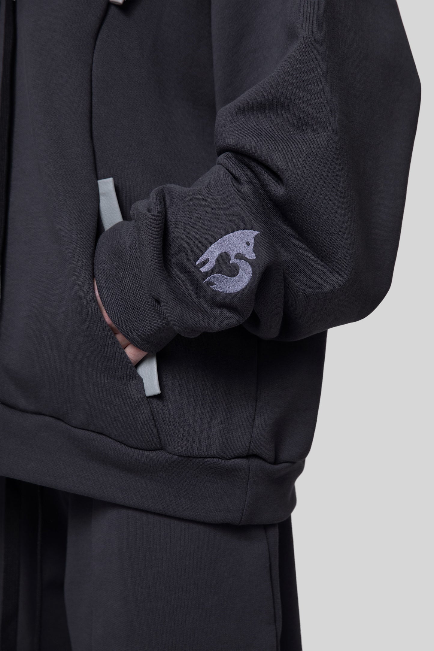 Close-up of sleeve embroidery on Anchor hoodie