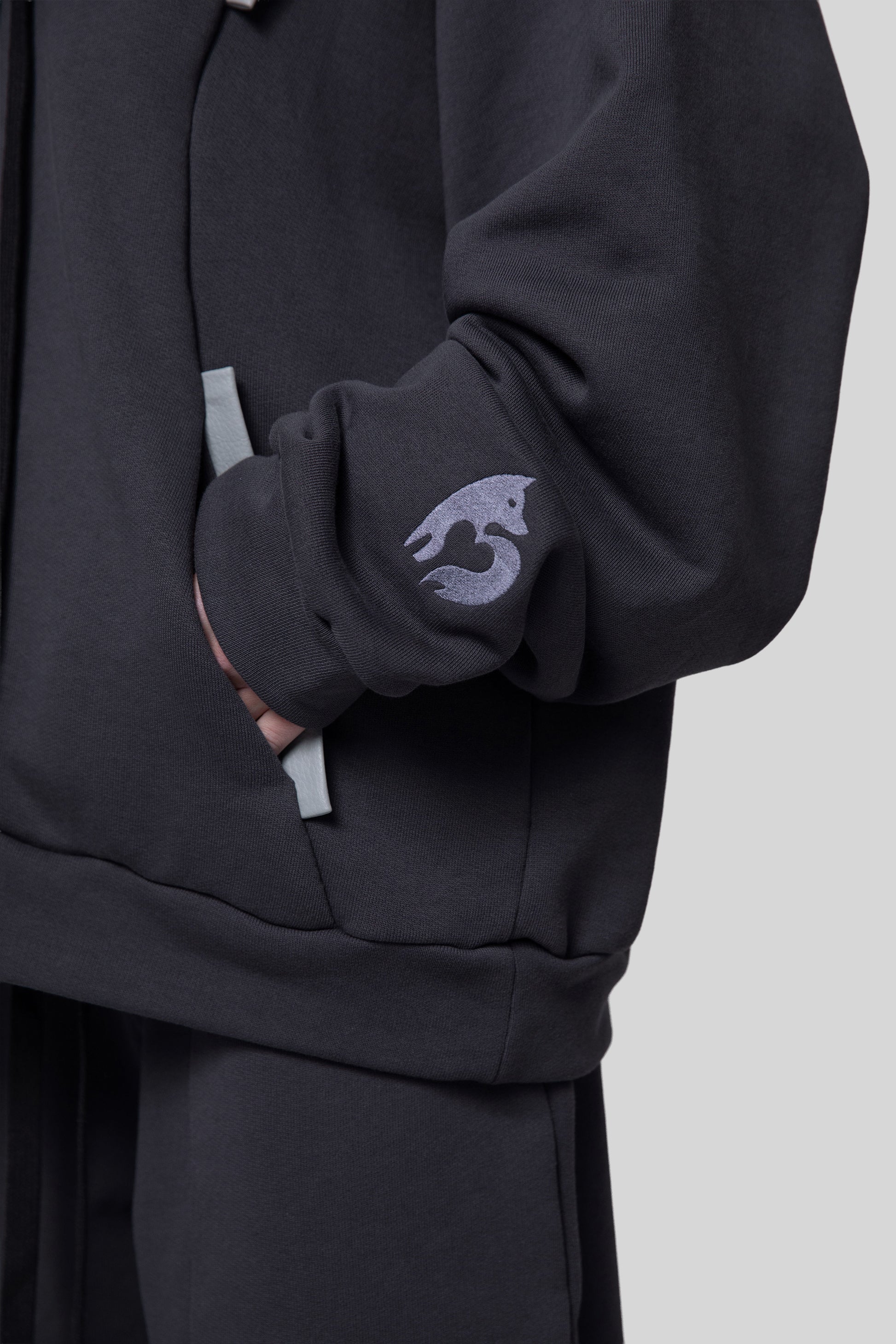 Close-up of sleeve embroidery on Anchor hoodie