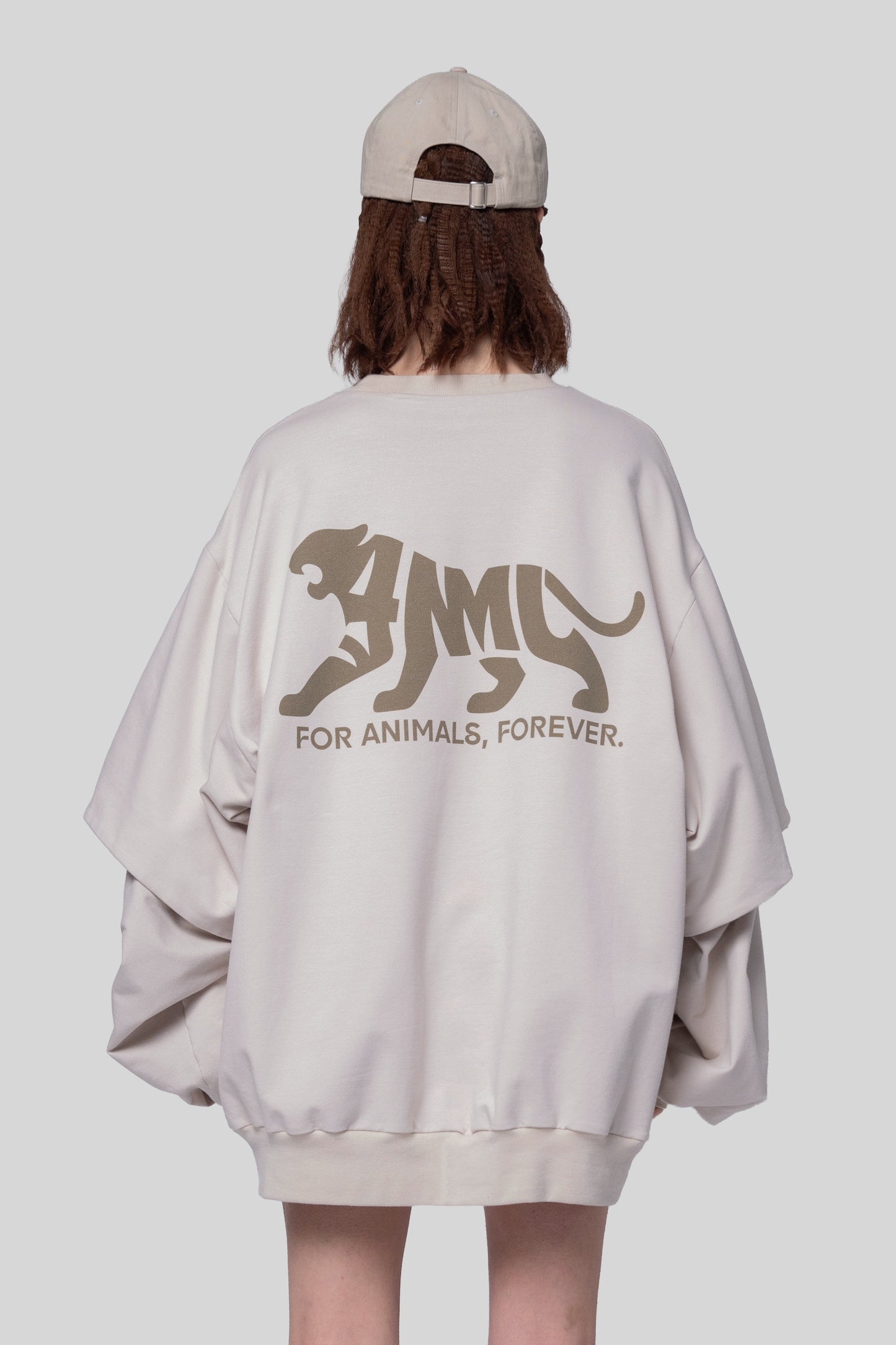Back view of Big Cat Crew sweatshirt with tiger graphic and text