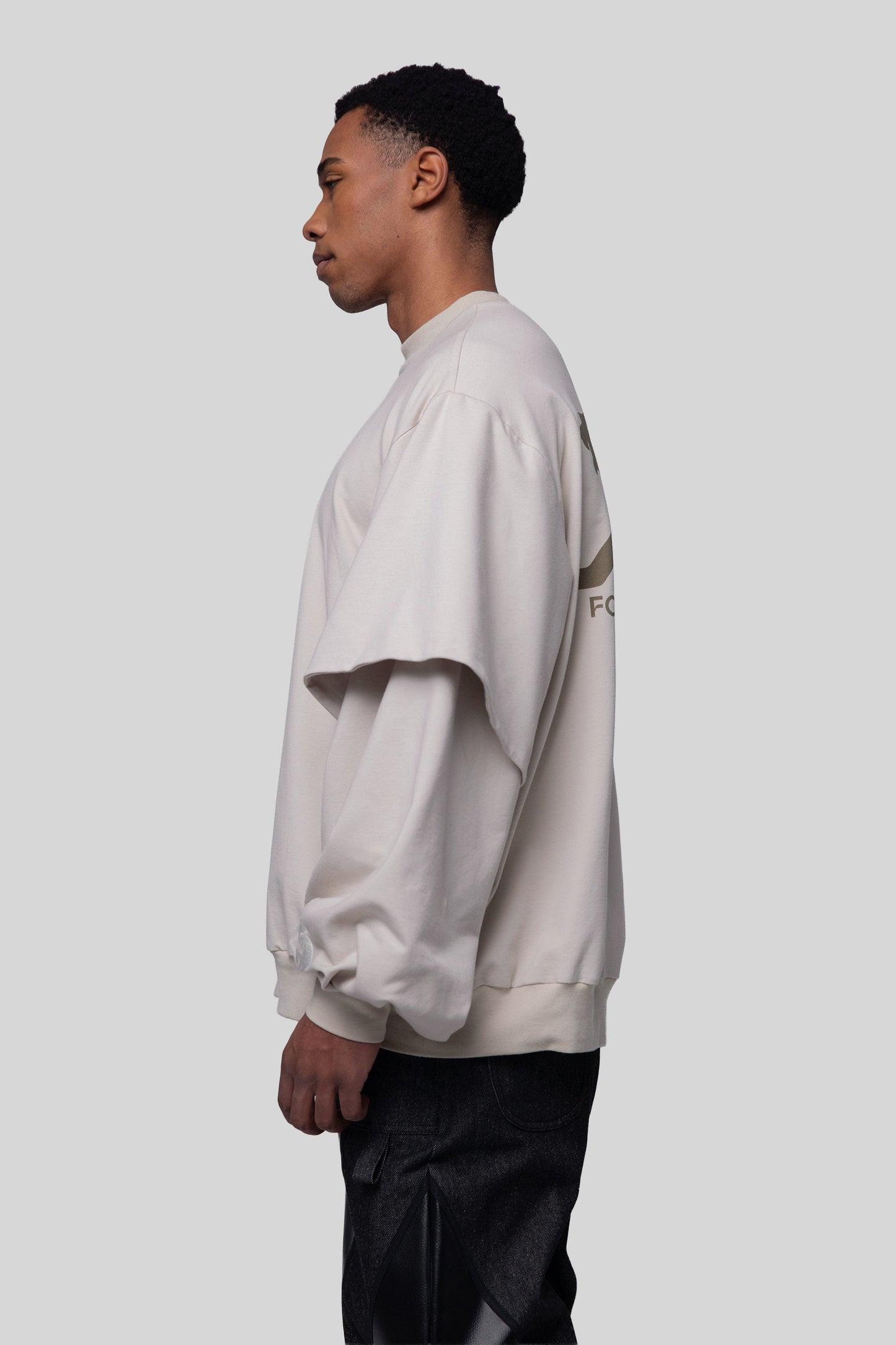 Side profile of Big Cat Crew sweatshirt with oversized fit
