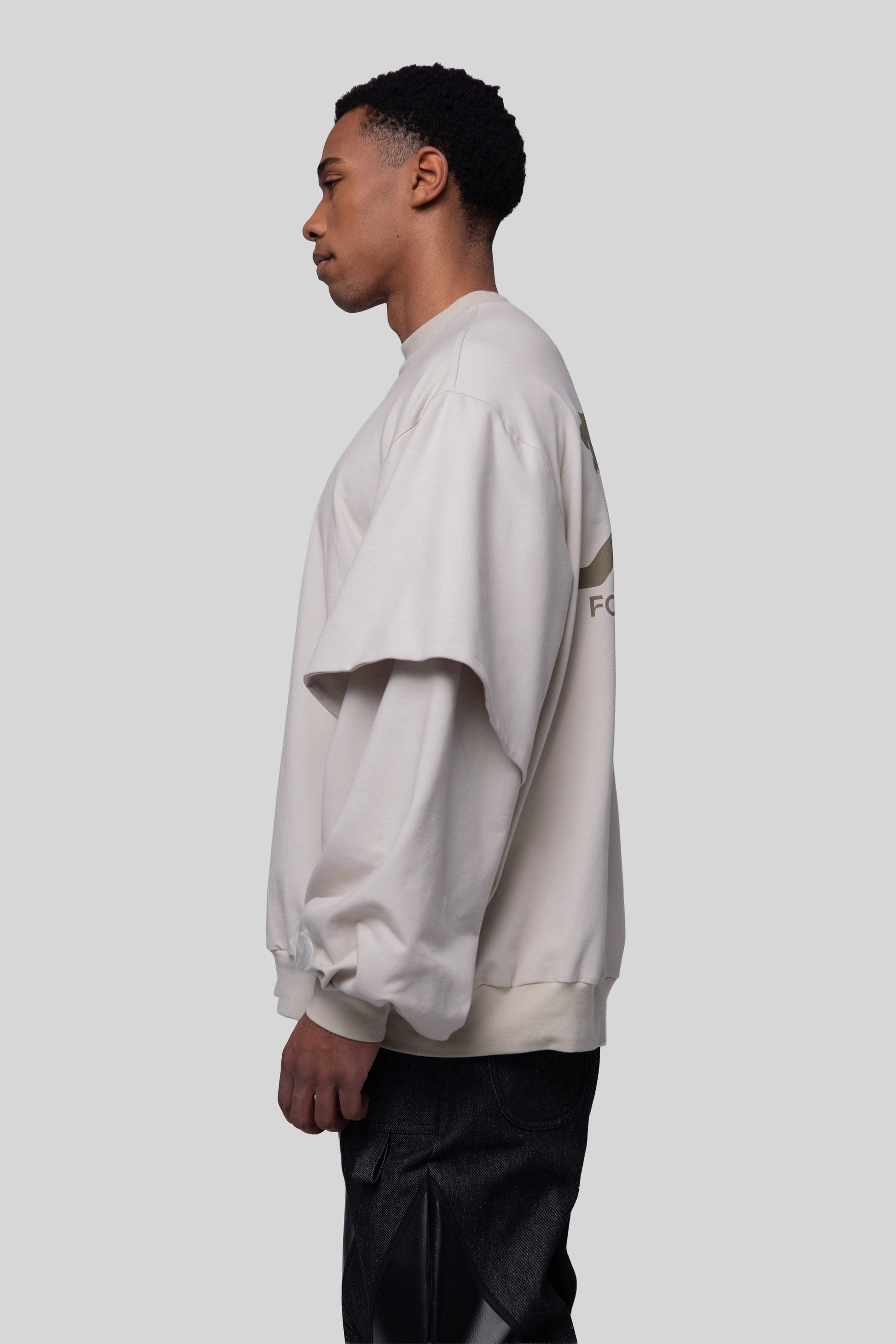 Side profile of Big Cat Crew sweatshirt with oversized fit