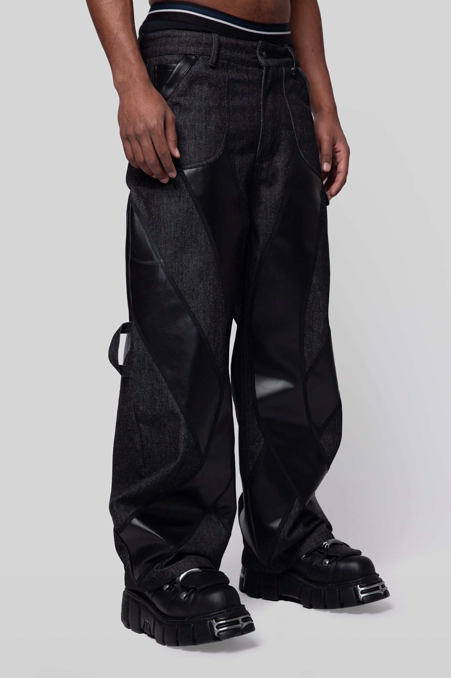 Angled view of Bloom jeans in carbon raw denim, relaxed fit