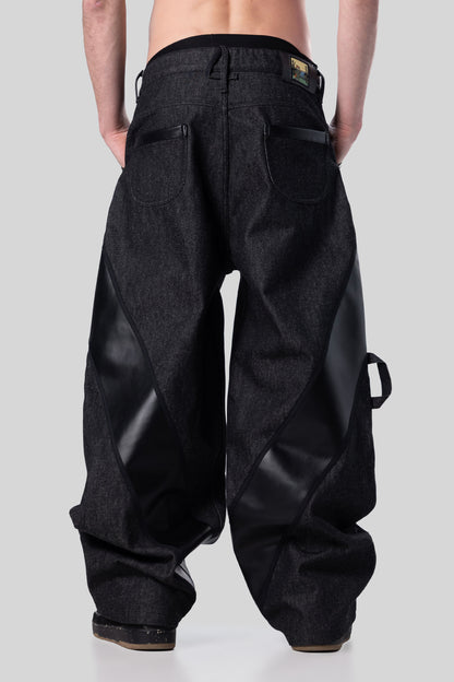 [card:men-secondary][card:all-secondary] Back view of Bloom jeans in carbon raw denim with relaxed drape