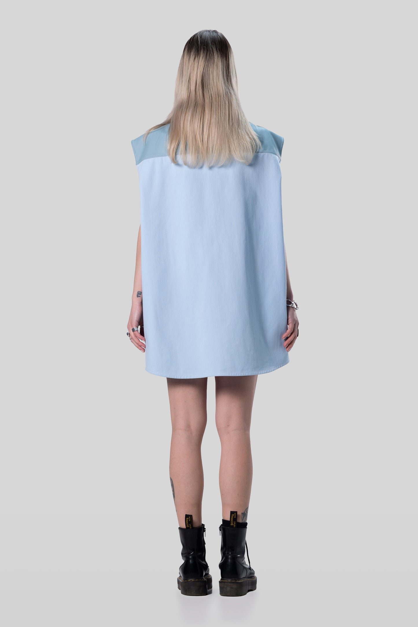 Full back view of Blue Collar vest in light blue