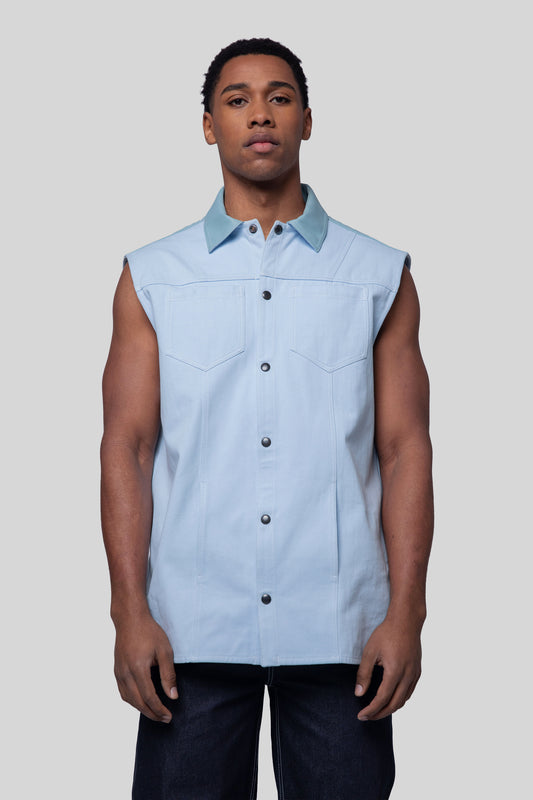 Front view of Blue Collar vest in light blue cotton twill with snap buttons