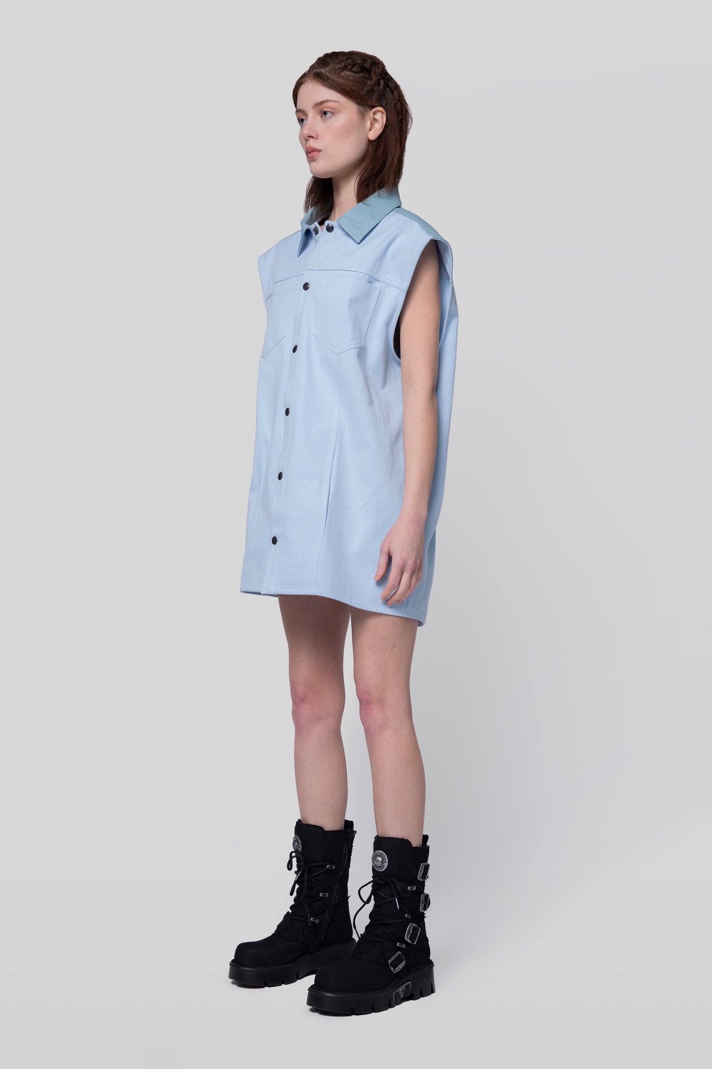 Angled full view of Blue Collar vest with relaxed silhouette