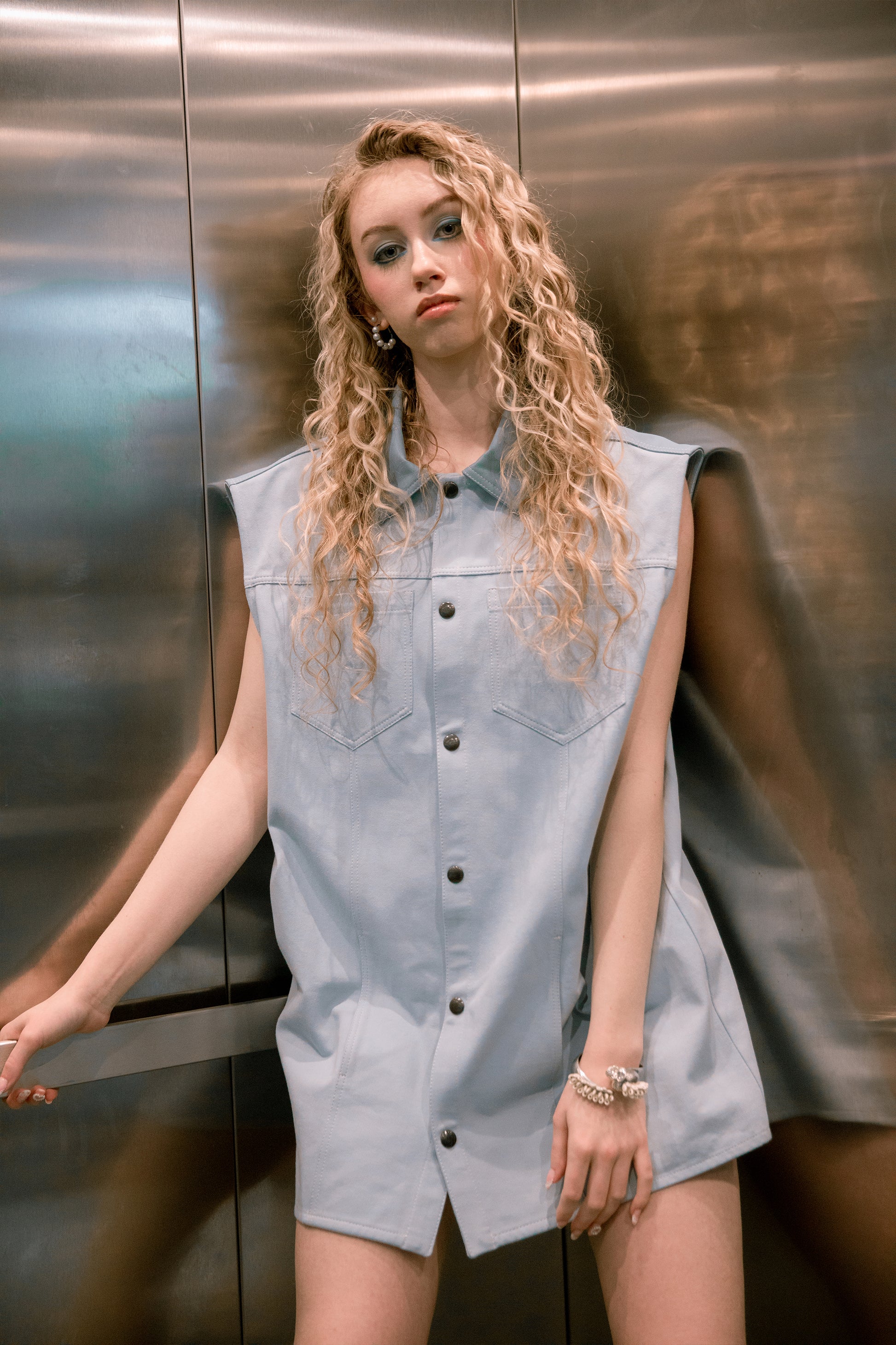 Portrait view of Blue Collar vest with structured neckline