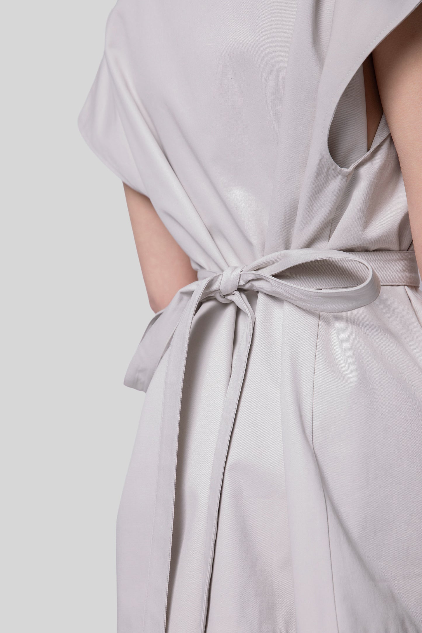 Close-up of removable cotton belt on Chameleon dress