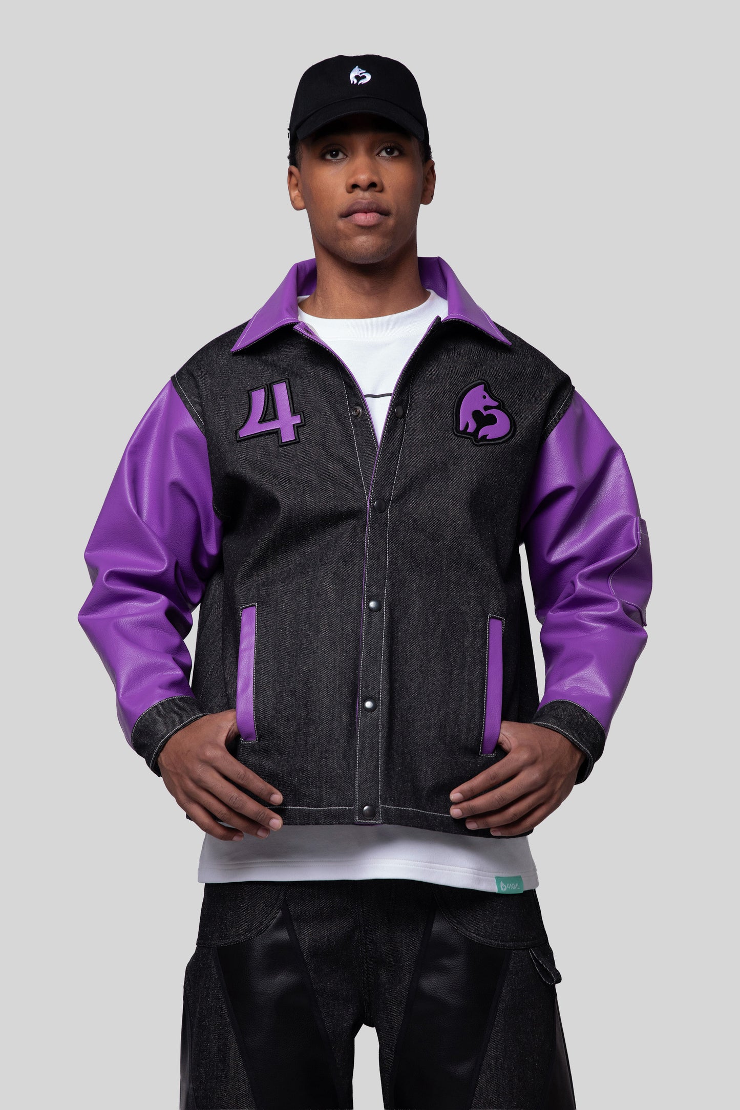Front view of Core jacket in carbon raw denim with Vegatex AppleSkin sleeves, collar, emblems, and pockets in deep lavender