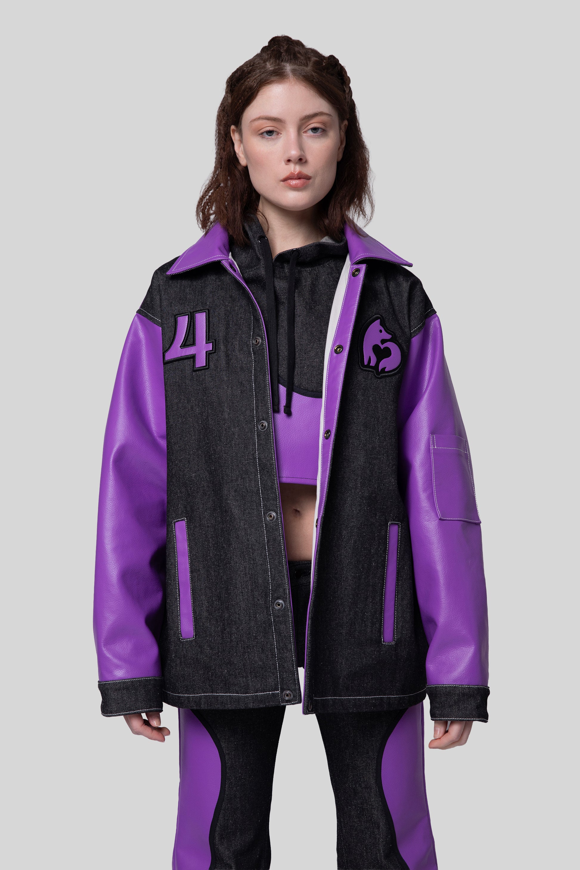 [card:women-primary] Model wearing Core jacket unfastened