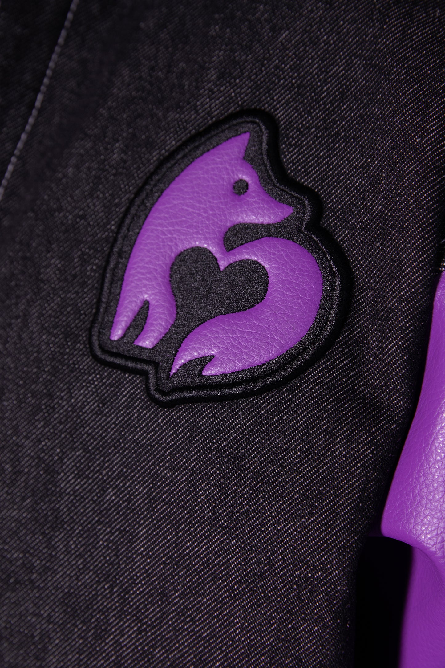 Close-up of fox logo patch on chest of Core jacket
