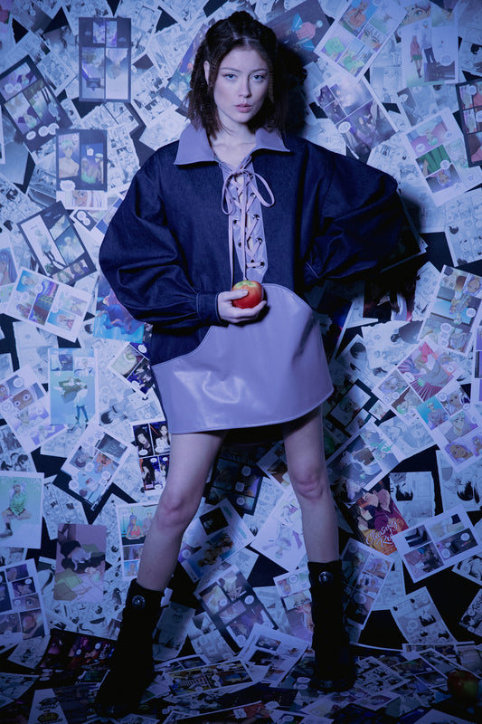 Model wearing 4NML Dovetail Dress in indigo Candiani raw denim with purple dove AppleSkin panel, campaign styling