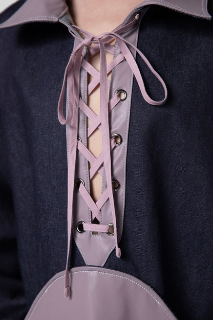Close-up of lace-up front detail on purple AppleSkin panel of Dovetail Dress