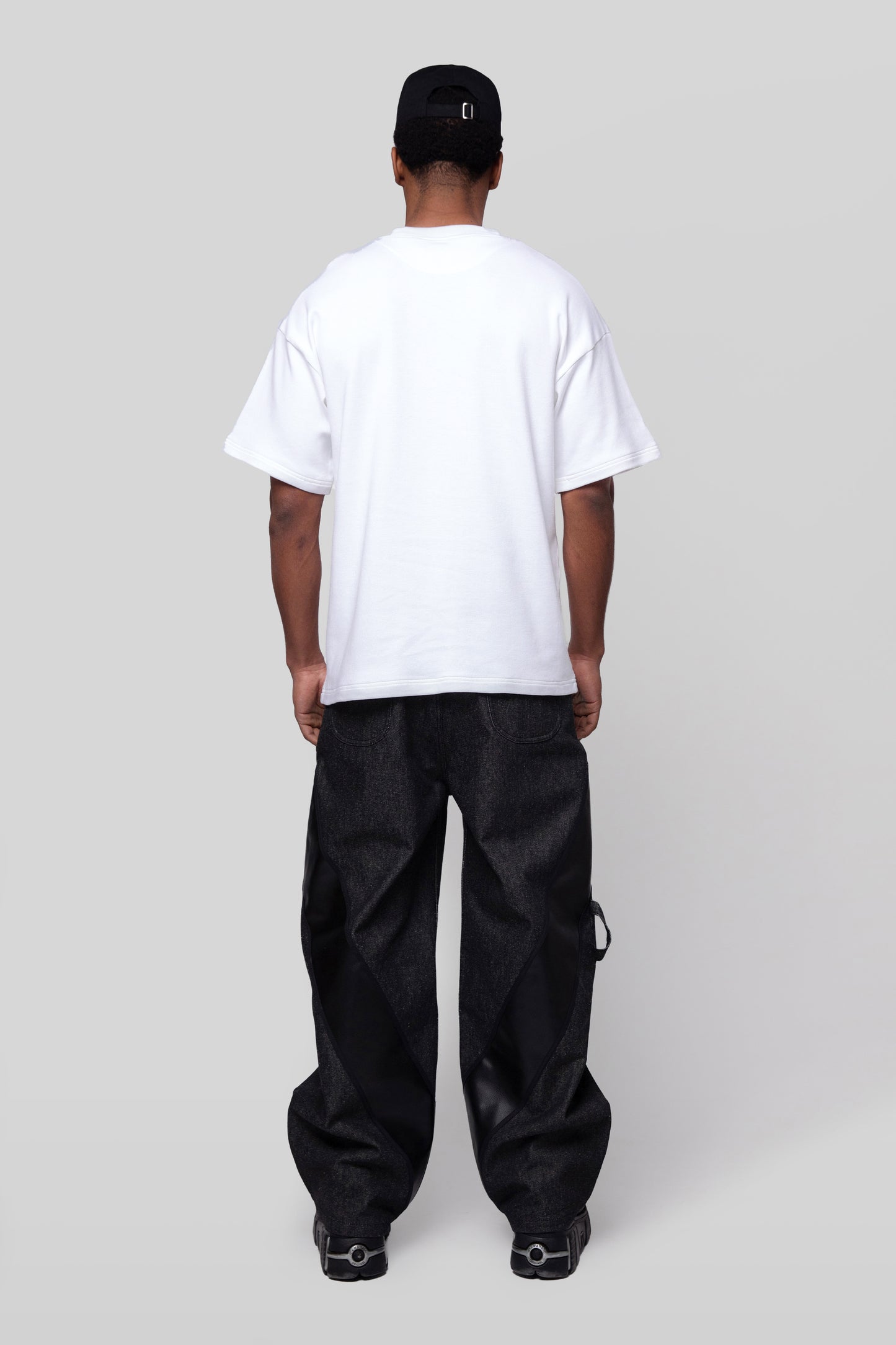 Back view of white Supima cotton Lineage Tee, clean finish