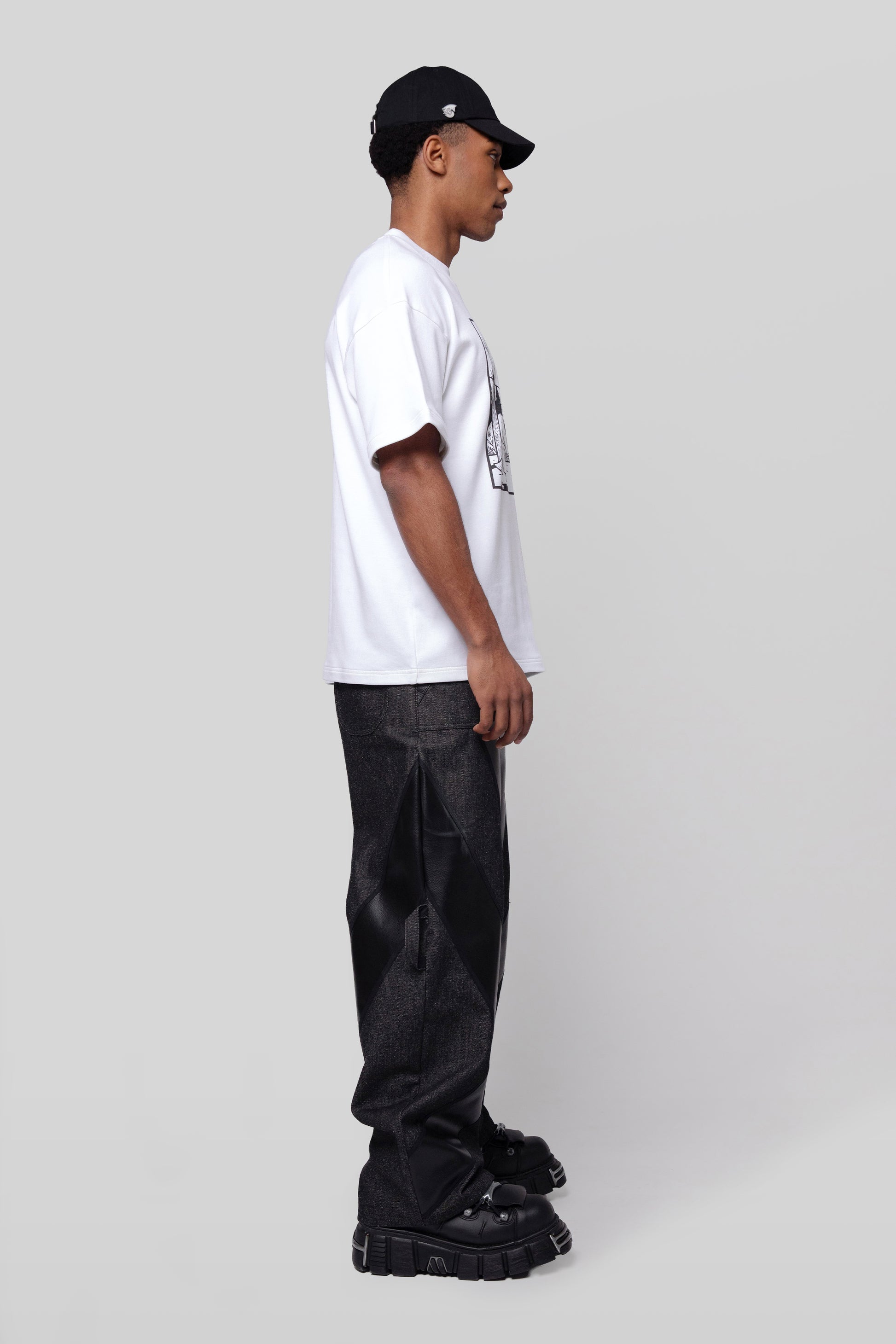Side profile of white Supima cotton Lineage Tee in Supima cotton, relaxed fit