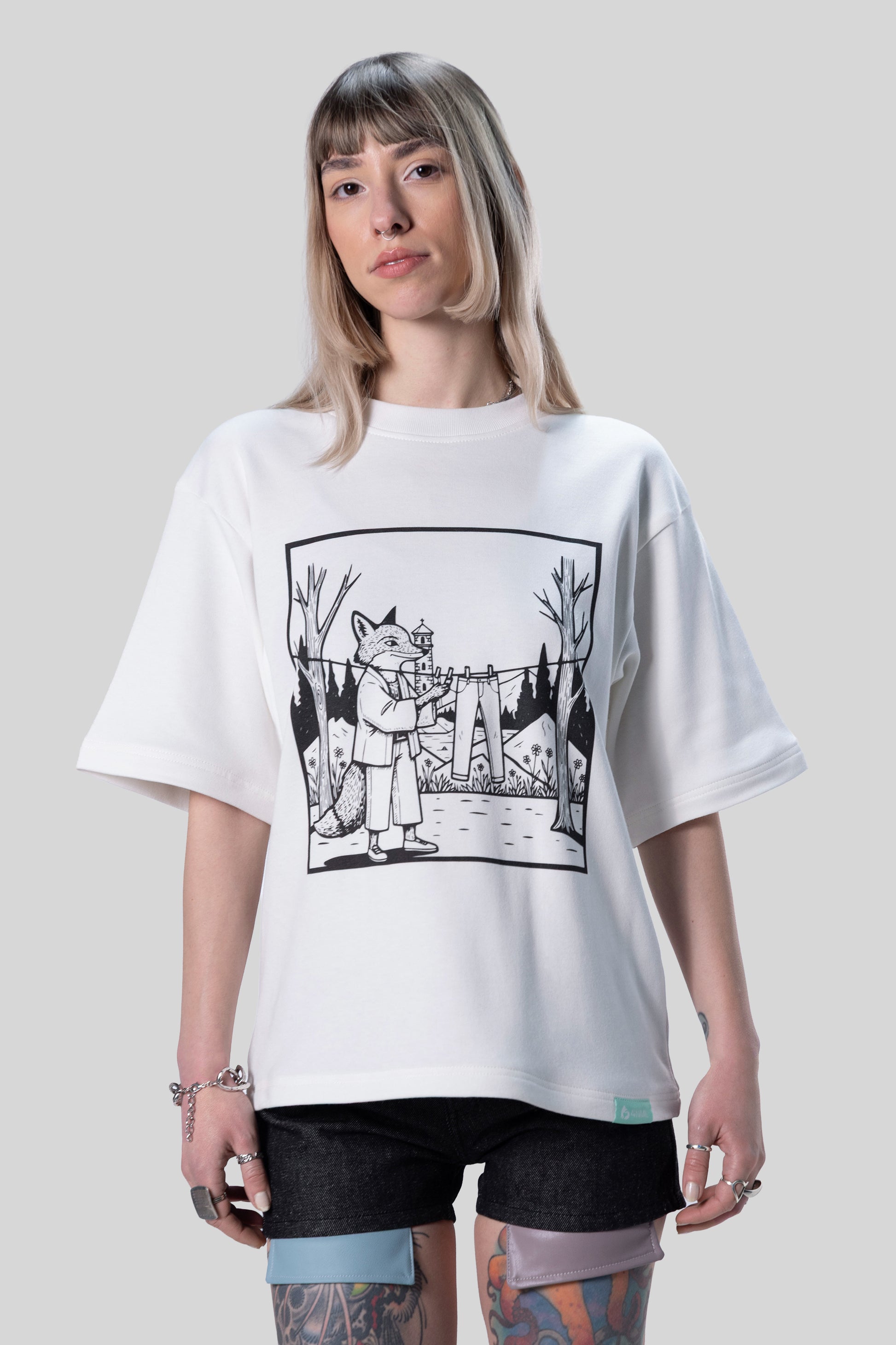 [card:women-secondary][card:all-secondary] Front view of white Supima cotton Women’s Lineage Tee with black fox graphic