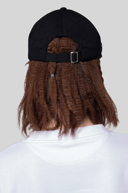 Back view of black No Cap hat with strap closure