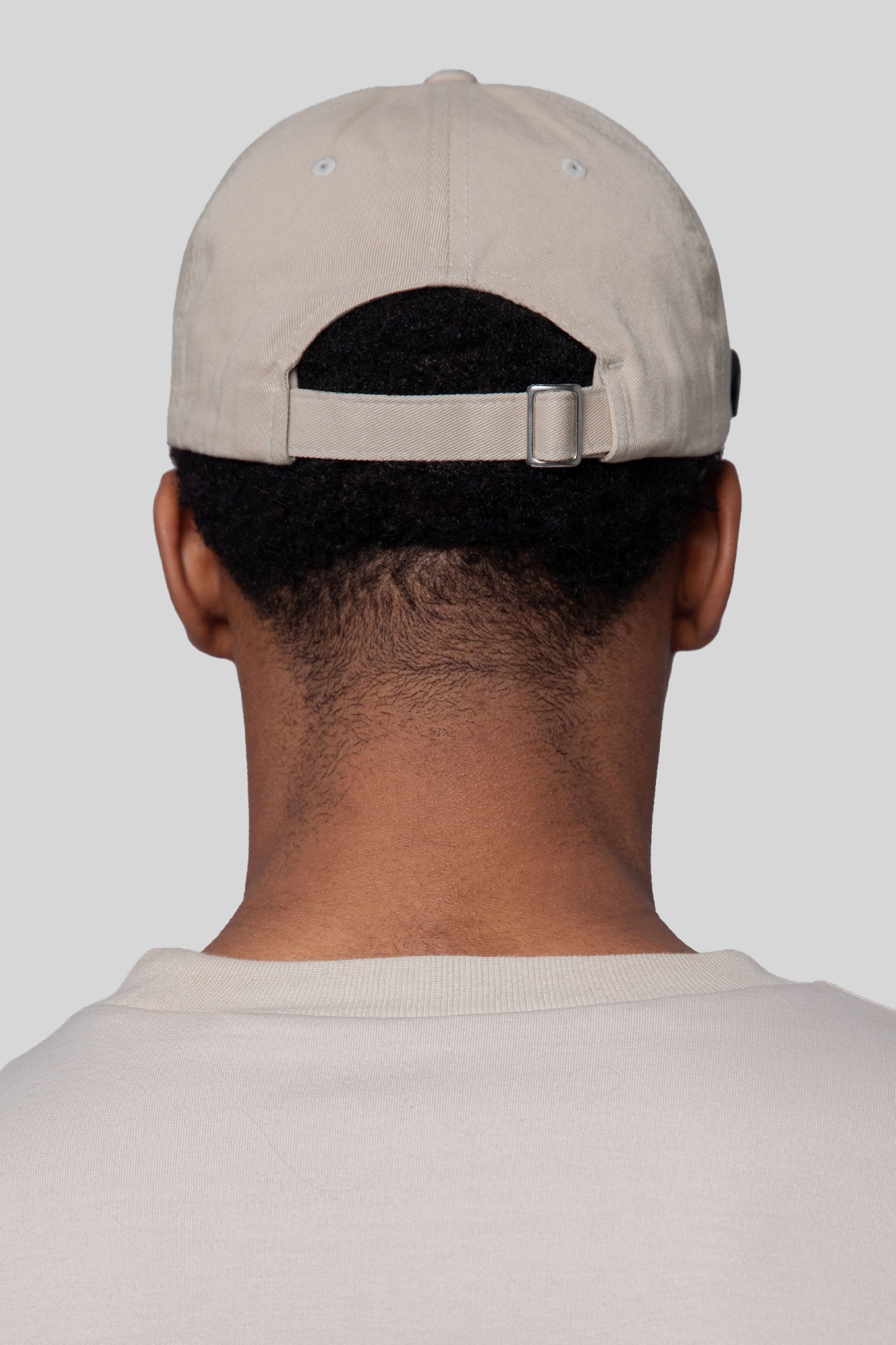 Back view of oak No Cap hat with adjustable strap