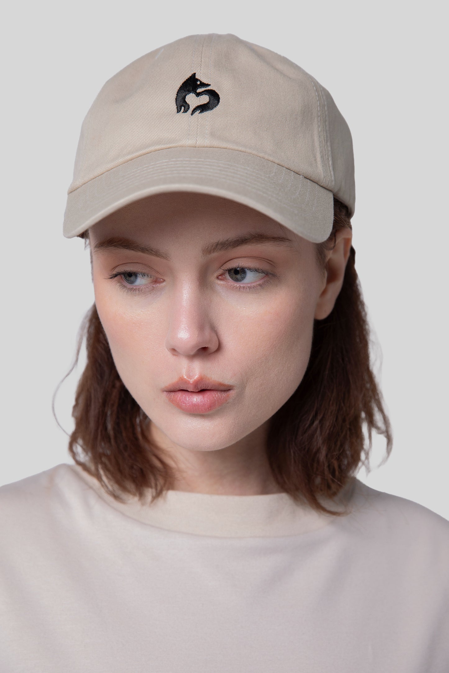 Front view of oak No Cap hat with low profile crown