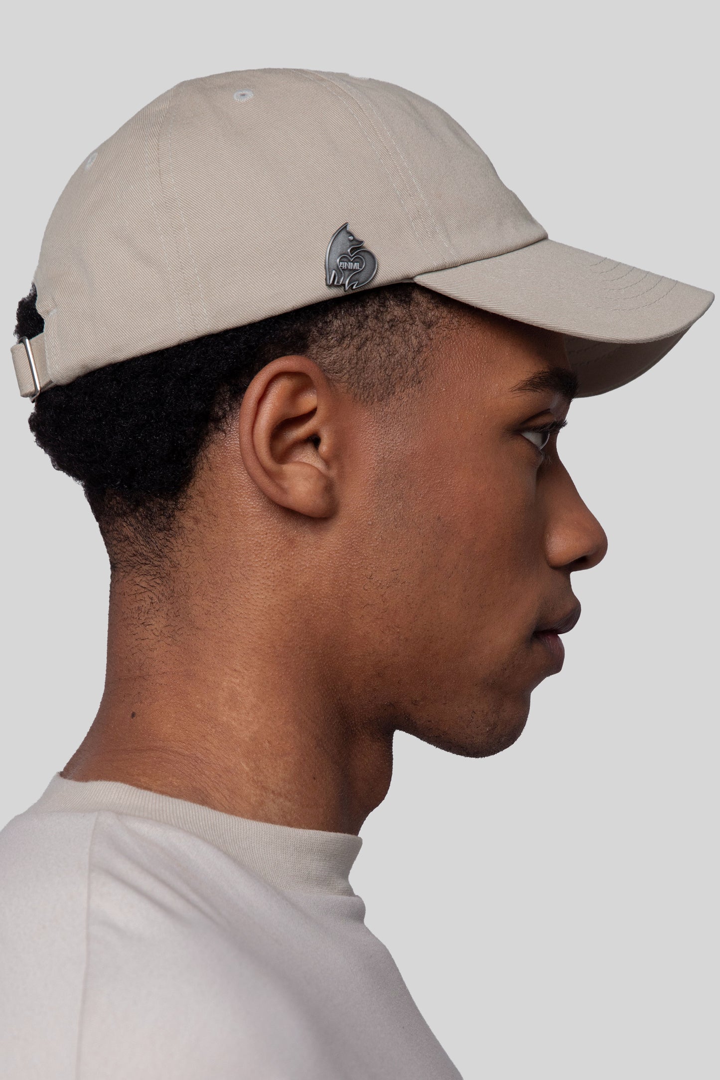 Side profile of oak No Cap hat with curved brim