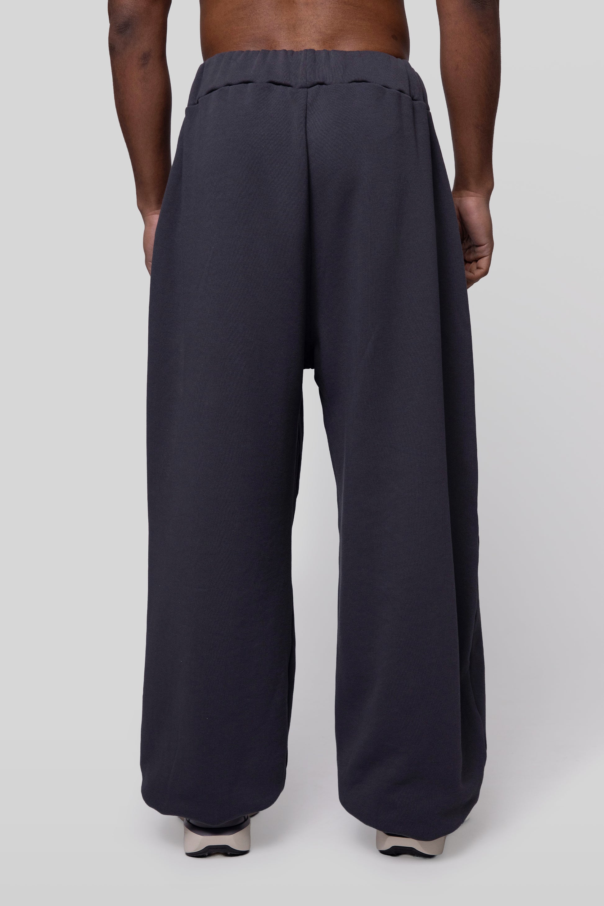 Back view of No Sweat pants in deep grey organic cotton, clean rear