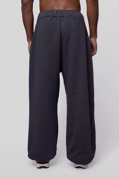 Back view of No Sweat pants in deep grey organic cotton, clean rear
