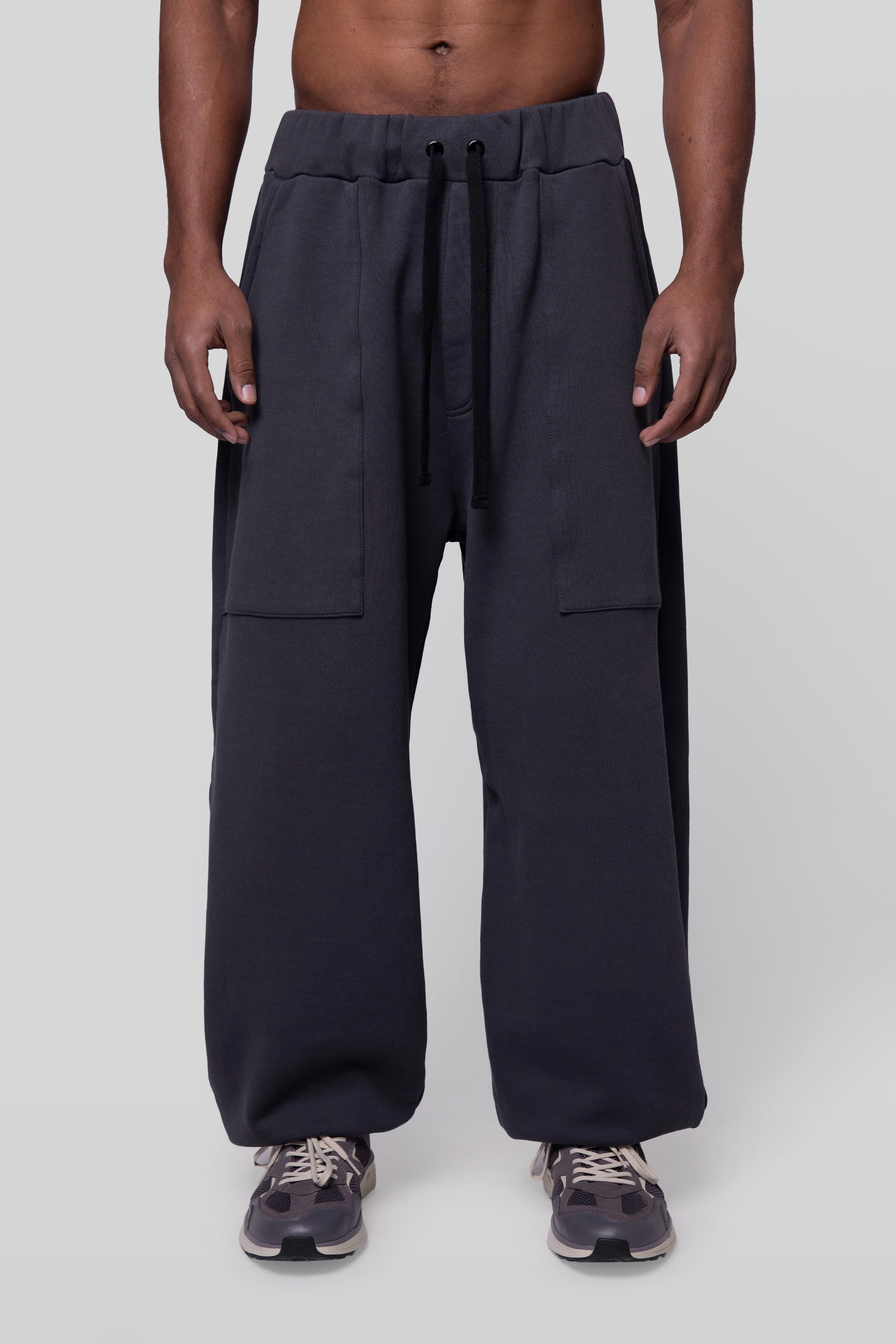 Front view of No Sweat pants in deep grey organic cotton with elastic waist