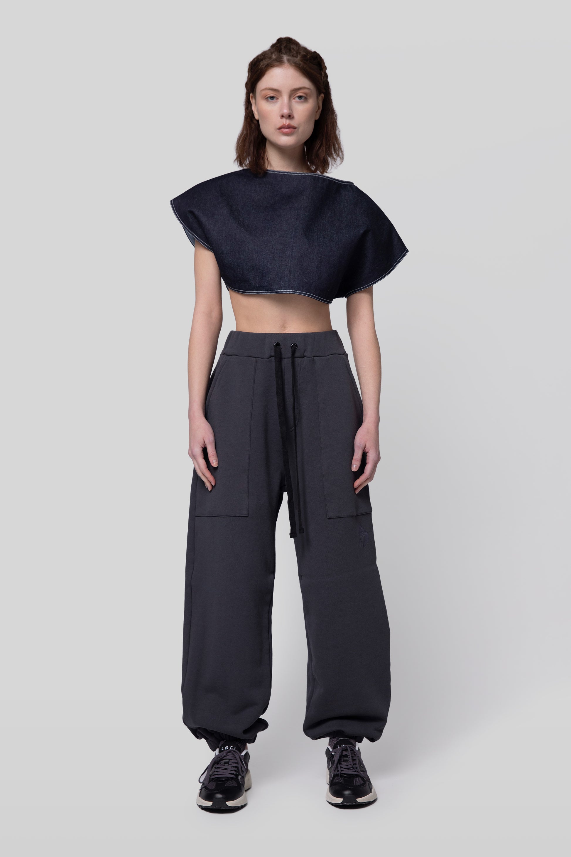 [card:women-primary][card:all-secondary] Full body view of No Sweat pants in deep grey organic cotton and Fly Girl Crop top on model