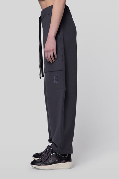 Side view of No Sweat pants with wide leg and ribbed ankle cuffs