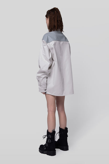 Angled back view of Out of Pocket shirt in light grey