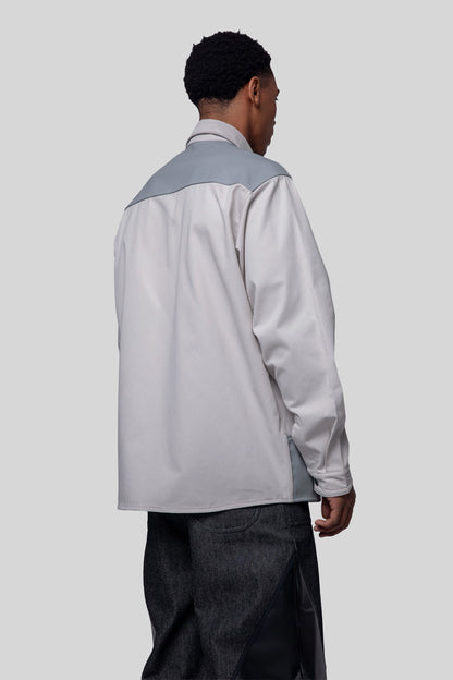 Back angled view of Out of Pocket shirt with panel detail