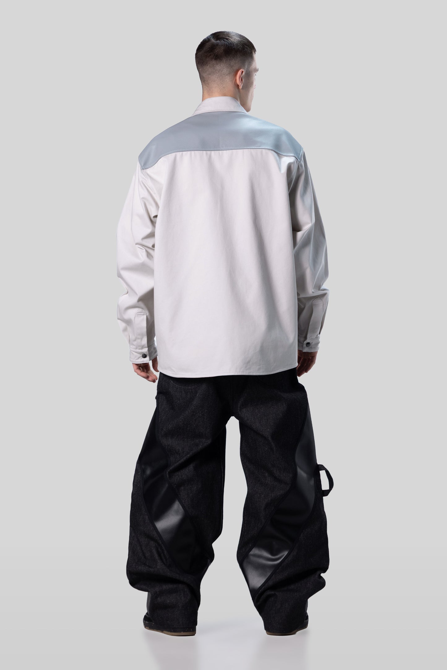[card:men-secondary] Back view of Out of Pocket shirt with AppleSkin panel