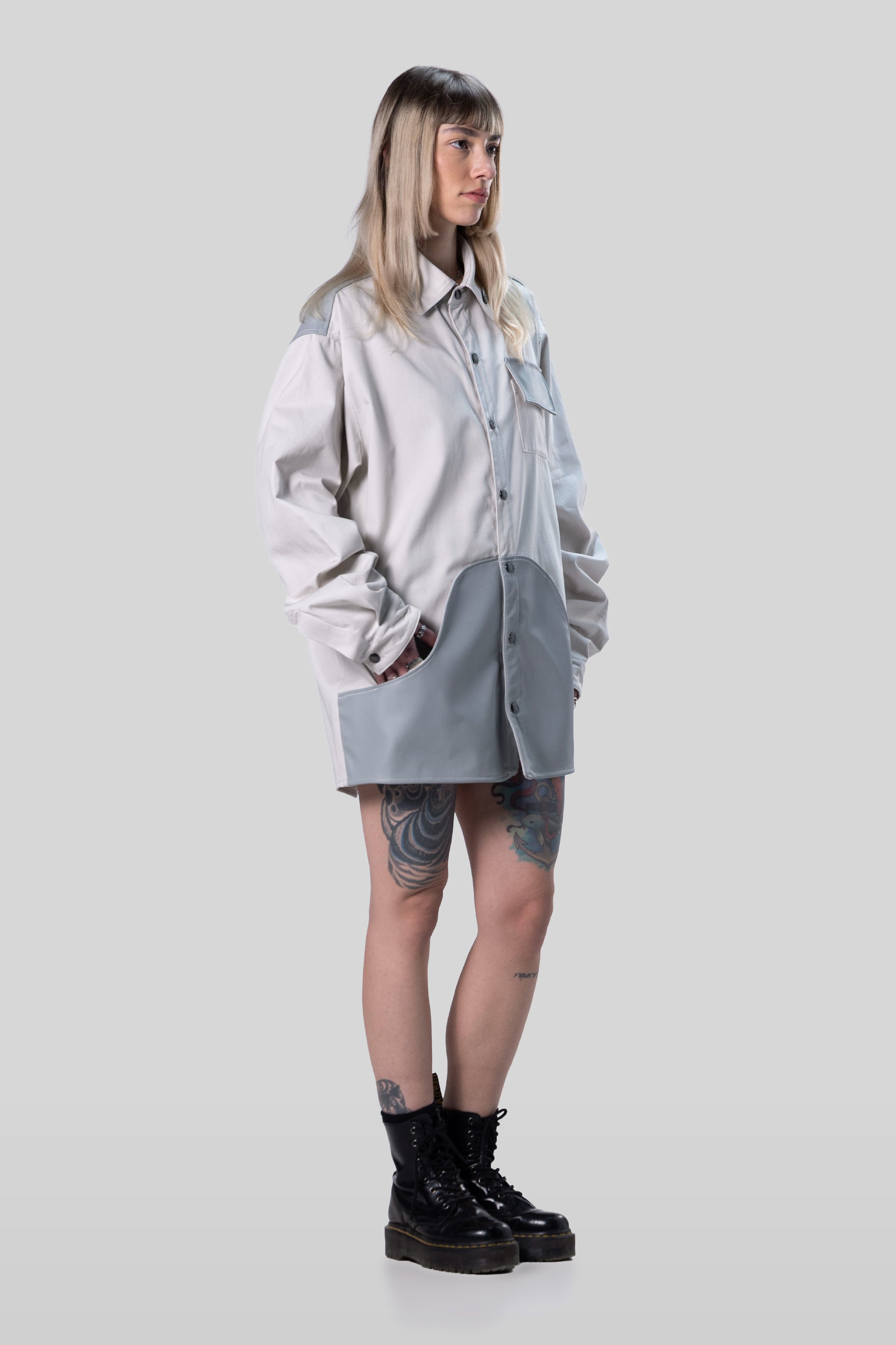 Front angled view of Out of Pocket shirt in light grey cotton