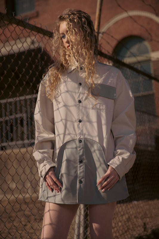 Model wearing 4NML Out of Pocket shirt in light grey cotton with AppleSkin pouch pocket and panel, relaxed fit