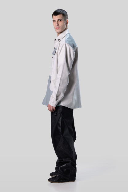 Side profile of Out of Pocket shirt in light grey with relaxed drape