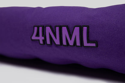 Close-up of lavender AppleSkin 4NML embroidery on purple canvas cotton pet bed