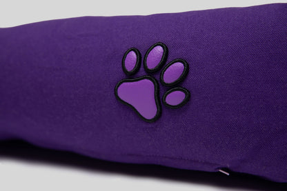 Close-up of lavender AppleSkin paw embroidery on purple canvas cotton pet bed
